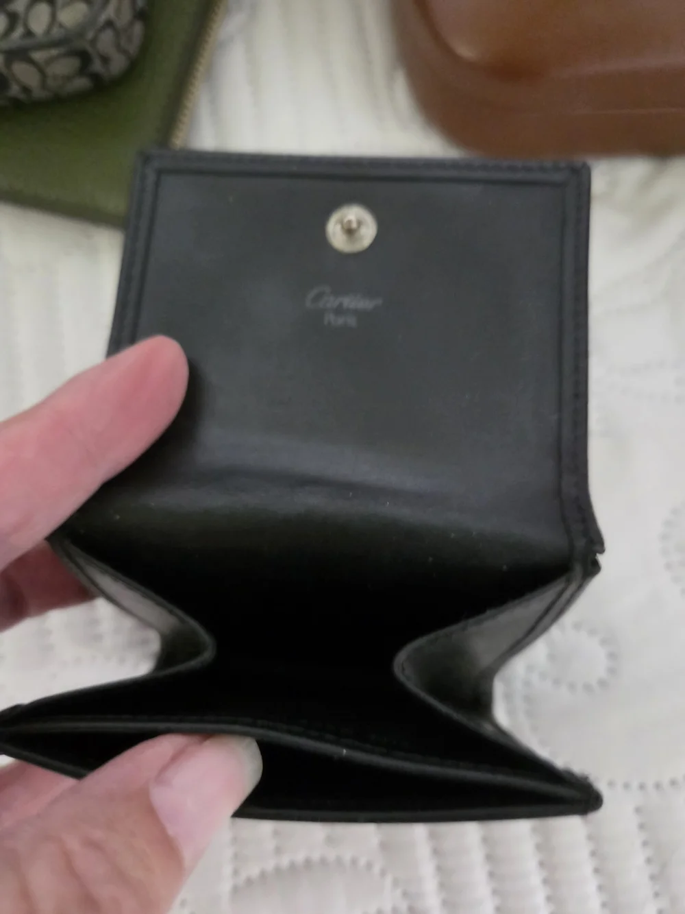 Cartier Black Leather Bi-Fold Card Holder with Silver Logo
